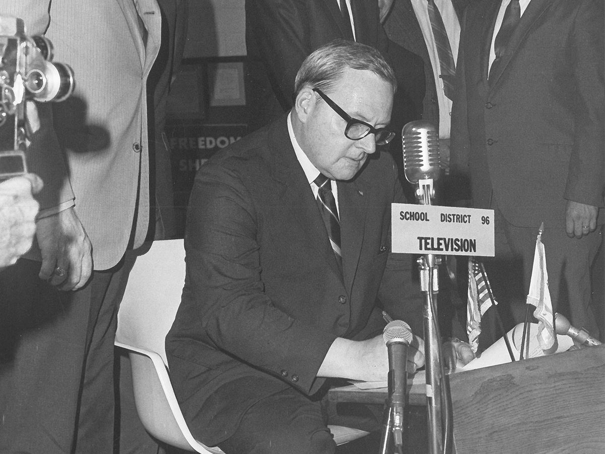 Governor Ogilvie signs law allowing for year around schooling.